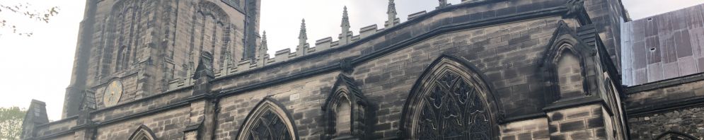 A full view of aLoughborough's medieval parish church, all saints with holy trinity church building.