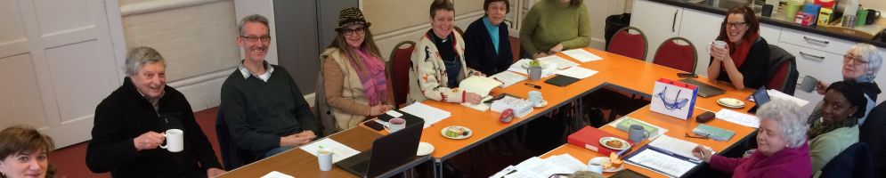 People sitting round a table at a meeting