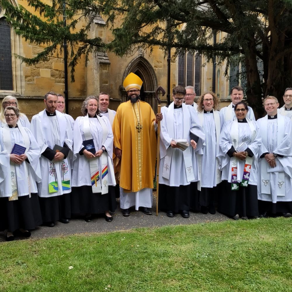The Bishop of Loughborough surrounded by newly ordained priests