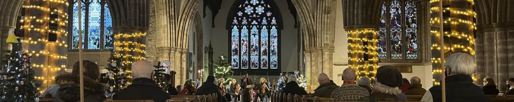 All Saints with Holy Trinity Church bedecked for Christmas