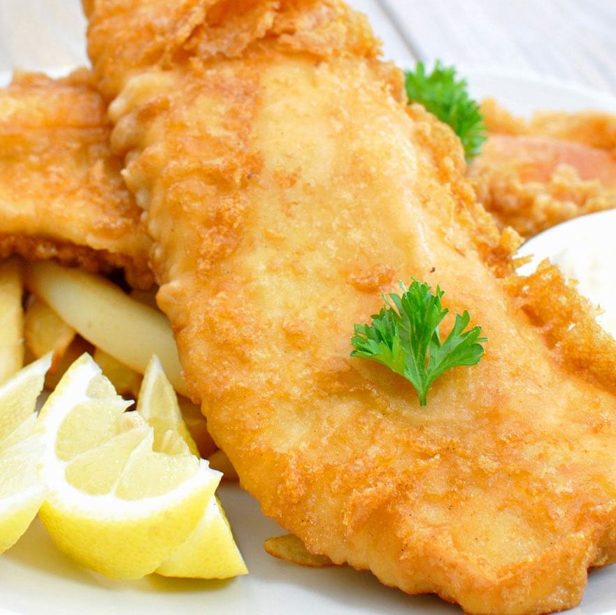 Battered FIsh and Chips on a plate